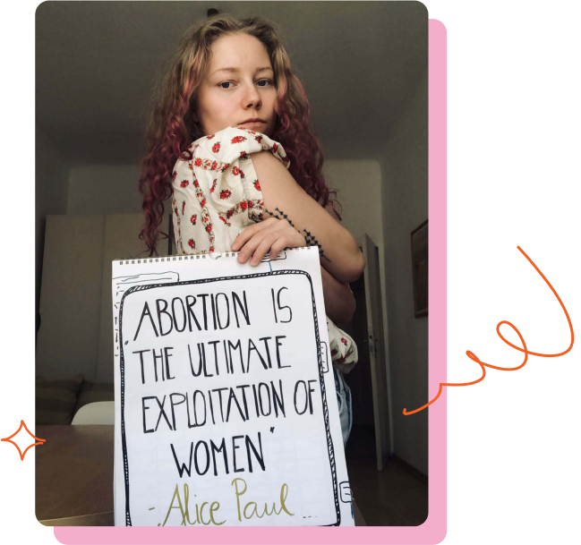 A photo of a female pro-lifer holding a sign with the Alice Paul quote "abortion is the ultimate exploitation of women"